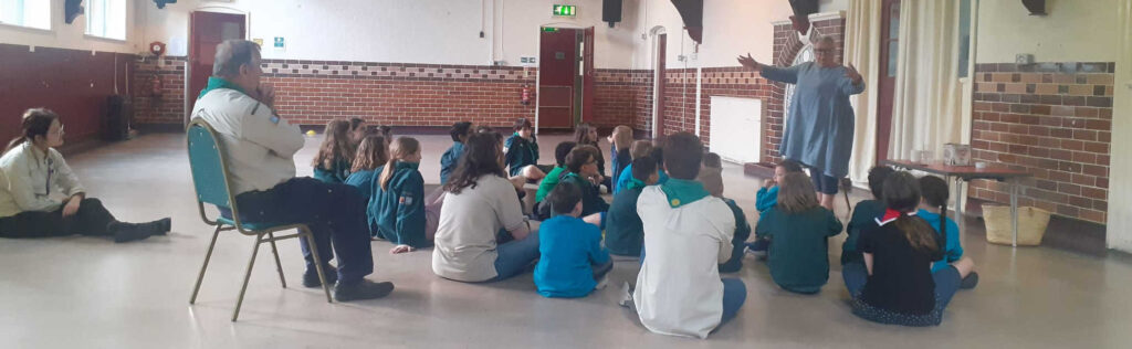 23rd Manchester Scout Group sat down in Birch Community Centre and gathered round Helen Stewart our story teller for the evening.